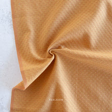 Load image into Gallery viewer, Golden Hour is a mixed weight cotton woven fabric collection by Fableism Supply Co. The palette is made of golden hues of light and graceful purples of a cool dusky night. Available at globalfibershop.com.