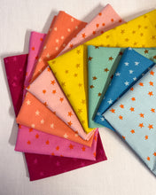 Load image into Gallery viewer, Rainbow set of colorful fabric swatches with star patterns on a white background. Starry available at globalfibershop.com.