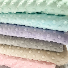 Load image into Gallery viewer, This exclusive Cuddle® minky plush fabric has a textured, velvety surface that features an adorable dimple embossed design. Not only does it look amazing sewn into quilts, baby products, apparel, etc., but it has a nice skin feel we can't get enough of! Available at globalfibershop.com.