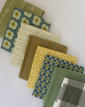 Load image into Gallery viewer, Collection of patterned fabric samples in green, yellow, and brown tones on a light background.