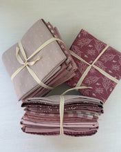 Load image into Gallery viewer, Three bundles of fabric tied with string on a light background