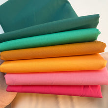 Load image into Gallery viewer, This limited color version of the Wildflower Quilt Pattern from Suzy Quilts features 6 Art Gallery Fabrics PURE solids. We took our color inspiration from Art Gallery Fabrics’ Abode Collection, which makes perfect color-coordinated backings. Availabe at globalfibershop.com.