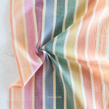 Load image into Gallery viewer, Embrace the charm of the rainbow with Fableism Supply Co’s ‘Lucky Loom’ fabric collection—a dazzling fusion of mixed weight wovens inspired by moments of serendipity. This collection’s palette radiates warmth and whimsy, featuring golden yellows, soft pinks, earthy greens, tranquil blues, and rich purples, each reminiscent of the colors in a lucky rainbow. Available at globalfibershop.com.
