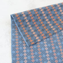 Load image into Gallery viewer, Blue and orange woven fabric. Embrace the charm of the rainbow with Fableism Supply Co’s ‘Lucky Loom’ fabric collection—a dazzling fusion of mixed weight wovens inspired by moments of serendipity. This collection’s palette radiates warmth and whimsy, featuring golden yellows, soft pinks, earthy greens, tranquil blues, and rich purples, each reminiscent of the colors in a lucky rainbow. Available at globalfibershop.com.