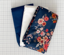 Load image into Gallery viewer, Hearth and Home Expansion bundle from The Seasoned Homemaker features a timeless blue and white design with a sophisticated floral background. Available at globalfibershop.com.