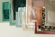 Load image into Gallery viewer, Wildflower Wovens embodies a handmade charm reminiscent of stumbling upon a wild, untamed floral marvel in the heart of nature. Available from globalfibershop.com.