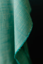 Load image into Gallery viewer, Wildflower Wovens embodies a handmade charm reminiscent of stumbling upon a wild, untamed floral marvel in the heart of nature. Available from globalfibershop.com.