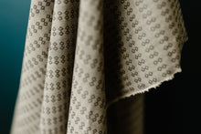 Load image into Gallery viewer, Wildflower Wovens embodies a handmade charm reminiscent of stumbling upon a wild, untamed floral marvel in the heart of nature. Available from globalfibershop.com.