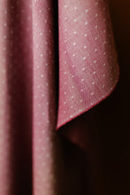 Load image into Gallery viewer, Wildflower Wovens embodies a handmade charm reminiscent of stumbling upon a wild, untamed floral marvel in the heart of nature. Available from globalfibershop.com.