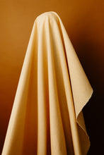 Load image into Gallery viewer, Wildflower Wovens embodies a handmade charm reminiscent of stumbling upon a wild, untamed floral marvel in the heart of nature. Available from globalfibershop.com.