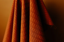 Load image into Gallery viewer, Wildflower Wovens embodies a handmade charm reminiscent of stumbling upon a wild, untamed floral marvel in the heart of nature. Available from globalfibershop.com.