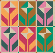 Load image into Gallery viewer, This limited color version of the Wildflower Quilt Pattern from Suzy Quilts features 6 Art Gallery Fabrics PURE solids. We took our color inspiration from Art Gallery Fabrics’ Abode Collection, which makes perfect color-coordinated backings. Availabe at globalfibershop.com.