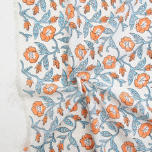 Load image into Gallery viewer, Floral fabric pattern with orange and blue flowers on a white background. ndian Block Prints by Fableism available at globalfibershop.com.
