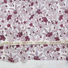 Load image into Gallery viewer, Fabric with a purple floral pattern and 'Fableism' branding. Indian Block Prints available at globalfibershop.com.