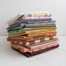 Load image into Gallery viewer, Canyon Springs is Fableism Supply Co’s latest mixed weight wovens collection featuring new textures, new weaves, and some returning favorites. Inspired by the vastness of the grand canyon and its full spectrum of life and color. The colors are a punchy mix of hues from golden ochre to deep periwinkle and crisp turquoise. Available at globalfibershop.com
