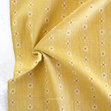 Load image into Gallery viewer, Forest Forage from Fablism's features 2 woven basics, Daisies and Honeycomb, in their signature earth-tone shades. These wovens are excellent staples in quilting, homewares and apparel. Ten new Daisy hues introducted for Fall 2024. Available at globalfibershop.com.