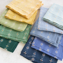 Load image into Gallery viewer, Forest Forage from Fablism's features 2 woven basics, Daisies and Honeycomb, in their signature earth-tone shades. These wovens are excellent staples in quilting, homewares and apparel. Ten new Daisy hues introducted for Fall 2024. Available at globalfibershop.com.