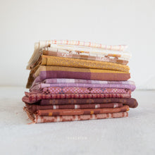 Load image into Gallery viewer, Golden Hour is a mixed weight cotton woven fabric collection by Fableism Supply Co. The palette is made of golden hues of light and graceful purples of a cool dusky night. Available at globalfibershop.com.