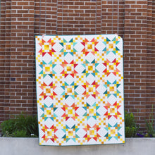 Load image into Gallery viewer, The Starlite Quilt Pattern is a wonderful scrap buster pattern. Fabric requirements are included in this listing. Global Fiber Shop also curated the Shining Bright bundle to go with this pattern. Paper pattern available at globalfibershop.com.