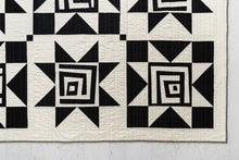 Load image into Gallery viewer, Black and White Shining Star quilt kit for Suzy Quilts sold at Global Fiber Shop.

