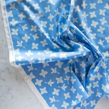 Load image into Gallery viewer, Gander the trees that produce the most beautiful of blooms, attracting lovely birds, butterflies, and bees to drink nectar, play in pollen, and seek shelter in their branches. Flowering trees features 13 prints on undyed organic cotton poplin. Sold at globalfibershop.com