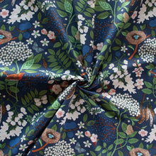 Load image into Gallery viewer, Gander the trees that produce the most beautiful of blooms, attracting lovely birds, butterflies, and bees to drink nectar, play in pollen, and seek shelter in their branches. Flowering trees features 13 prints on undyed organic cotton poplin. Sold at globalfibershop.com