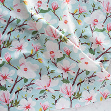 Load image into Gallery viewer, Gander the trees that produce the most beautiful of blooms, attracting lovely birds, butterflies, and bees to drink nectar, play in pollen, and seek shelter in their branches. Flowering trees features 13 prints on undyed organic cotton poplin. Sold at globalfibershop.com