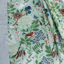 Load image into Gallery viewer, Gander the trees that produce the most beautiful of blooms, attracting lovely birds, butterflies, and bees to drink nectar, play in pollen, and seek shelter in their branches. Flowering trees features 13 prints on undyed organic cotton poplin. Sold at globalfibershop.com