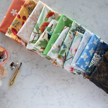 Load image into Gallery viewer, Gander the trees that produce the most beautiful of blooms, attracting lovely birds, butterflies, and bees to drink nectar, play in pollen, and seek shelter in their branches. Flowering trees features 13 prints on undyed organic cotton poplin. Sold at globalfibershop.com