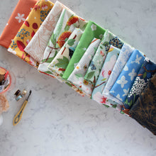 Load image into Gallery viewer, Gander the trees that produce the most beautiful of blooms, attracting lovely birds, butterflies, and bees to drink nectar, play in pollen, and seek shelter in their branches. Flowering trees features 13 prints on undyed organic cotton poplin. Sold at globalfibershop.com