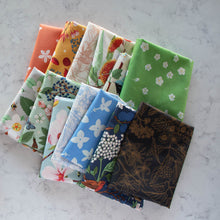 Load image into Gallery viewer, Gander the trees that produce the most beautiful of blooms, attracting lovely birds, butterflies, and bees to drink nectar, play in pollen, and seek shelter in their branches. Flowering trees features 13 prints on undyed organic cotton poplin. Sold at globalfibershop.com