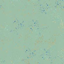 Load image into Gallery viewer, Speckled, brought to you by RSS designer Rashida Coleman Hall, features subtle speckled, (some metallic) blenders. We liken "speckled" to your happiest accident paint splatter turned perfect fabric background or blender. Sold at globalfibershop.com. Frost features a sage green background with blue and gold speckles.