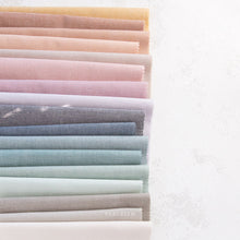 Load image into Gallery viewer, Everyday Chambray features a cotton/bamboo blend that makes for a dreamy soft hand. We are in love with these equally dreamy muted pastel shades. We predict Everyday Chambray is destined to be your next fabric obsession. Available at globalfibershop.com