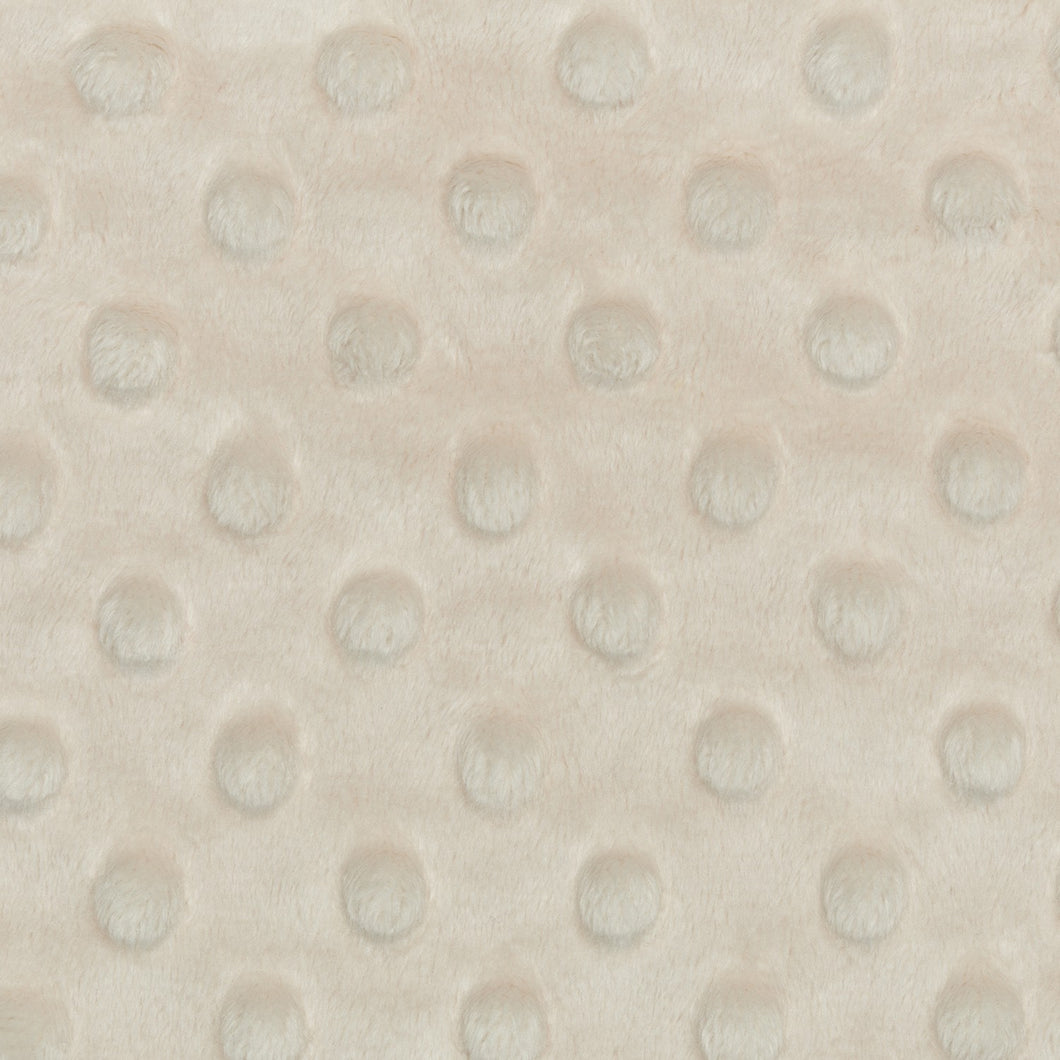 This exclusive Cuddle® minky plush fabric has a textured, velvety surface that features an adorable dimple embossed design. Not only does it look amazing sewn into quilts, baby products, apparel, etc., but it has a nice skin feel we can't get enough of! Available at globalfibershop.com.