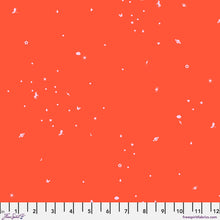 Load image into Gallery viewer, Small white objects on an orange background with a ruler at the bottom.
