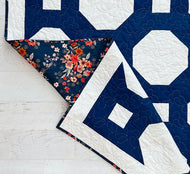 Hearth and Home Expansion bundle from The Seasoned Homemaker features a timeless blue and white design with a sophisticated floral background.  Available at globalfibershop.com.