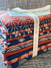 Load image into Gallery viewer, This bundle from Kokka contains fabric imported from Japan that features iconic design elements of Shibori prints and Sashiko quilting. With a weight comparable to light canvas or heavier linen, the fabric is well-suited for a range of applications including quilting, home goods, and apparel. Available at globalfibershop.com
