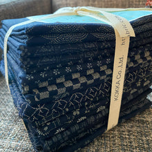 Load image into Gallery viewer, This bundle from Kokka contains fabric imported from Japan that features iconic design elements of Shibori prints and Sashiko quilting. With a weight comparable to light canvas or heavier linen, the fabric is well-suited for a range of applications including quilting, home goods, and apparel. Available at globalfibershop.com
