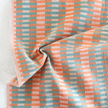 Load image into Gallery viewer, Embrace the charm of the rainbow with Fableism Supply Co’s ‘Lucky Loom’ fabric collection—a dazzling fusion of mixed weight wovens inspired by moments of serendipity. This collection’s palette radiates warmth and whimsy, featuring golden yellows, soft pinks, earthy greens, tranquil blues, and rich purples, each reminiscent of the colors in a lucky rainbow. Available at globalfibershop.com.
