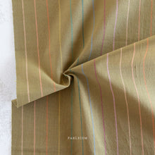 Load image into Gallery viewer, Embrace the charm of the rainbow with Fableism Supply Co’s ‘Lucky Loom’ fabric collection—a dazzling fusion of mixed weight wovens inspired by moments of serendipity. This collection’s palette radiates warmth and whimsy, featuring golden yellows, soft pinks, earthy greens, tranquil blues, and rich purples, each reminiscent of the colors in a lucky rainbow. Available at globalfibershop.com.
