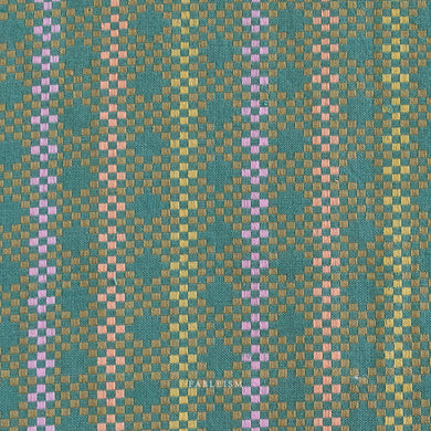 Woven fabric pattern with green, pink, and brown colors. Embrace the charm of the rainbow with Fableism Supply Co’s ‘Lucky Loom’ fabric collection—a dazzling fusion of mixed weight wovens inspired by moments of serendipity. This collection’s palette radiates warmth and whimsy, featuring golden yellows, soft pinks, earthy greens, tranquil blues, and rich purples, each reminiscent of the colors in a lucky rainbow. Available at globalfibershop.com.