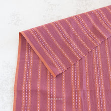 Load image into Gallery viewer,  Embrace the charm of the rainbow with Fableism Supply Co’s ‘Lucky Loom’ fabric collection—a dazzling fusion of mixed weight wovens inspired by moments of serendipity. This collection’s palette radiates warmth and whimsy, featuring golden yellows, soft pinks, earthy greens, tranquil blues, and rich purples, each reminiscent of the colors in a lucky rainbow. Available at globalfibershop.com.
