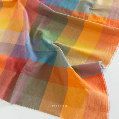When you think light and cheery, think Lumiere. Fableism Supply Co.'s  brand new wide-width 100% cotton collection with rainbows galore. Made with the apparel sewist in mind, they created these sunshiny cottons in a sweeping bouquet of prismatic rainbow color. Go bold or go retro! These wide width plaids and checkers will make for dazzling pieces. Available at globalifbershop.com.