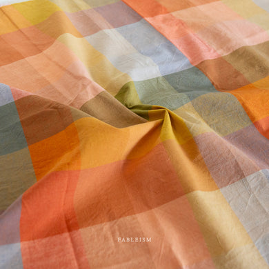 When you think light and cheery, think Lumiere. Fableism Supply Co.'s  brand new wide-width 100% cotton collection with rainbows galore. Made with the apparel sewist in mind, they created these sunshiny cottons in a sweeping bouquet of prismatic rainbow color. Go bold or go retro! These wide width plaids and checkers will make for dazzling pieces. Available at globalifbershop.com.