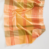 When you think light and cheery, think Lumiere. Fableism Supply Co.'s&nbsp; brand new wide-width 100% cotton collection with rainbows galore. Made with the apparel sewist in mind, they created these sunshiny cottons in a sweeping bouquet of prismatic rainbow color. Go bold or go retro! These wide width plaids and checkers will make for dazzling pieces. Available at globalifbershop.com.