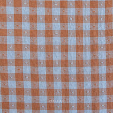 Load image into Gallery viewer, The Queen of Hearts has arrived and she’s got 14 beautiful new heart ginghams and dobby hearts in the most wearable colors! For the first time ever, at 55” wide, these whimsical cottons are perfect for Valentines apparel fabrics and also still the 100% cotton our quilters and crafters have come to love. Available at globalfibershop.com.
