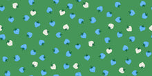 Load image into Gallery viewer, Pattern of blue and white strawberries on a green background
