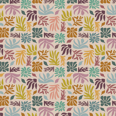 Patterned fabric with colorful leaves on a beige background. Available at globalfibershop.com.