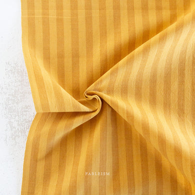 Sun Stripes, our latest two color cotton stripe fabric collection featuring an array of dazzling colors plucked from our earthy palette. From Fableism Supply Co. available at globalfibershop.com.