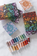 Aurifil's brand new 100% cotton 8wt thread in 20 brilliant hues is curated by Suzy Quilts. Available at globalfibershop.com.